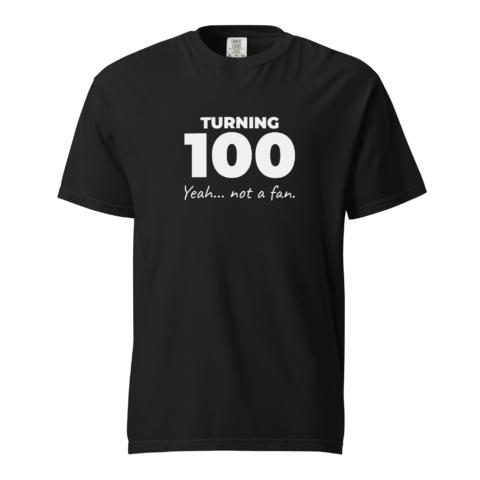 Not A Fan Brand - Black T-shirt with the text "TURNING 100 Yeah... not a fan." printed in bold white letters on the front.